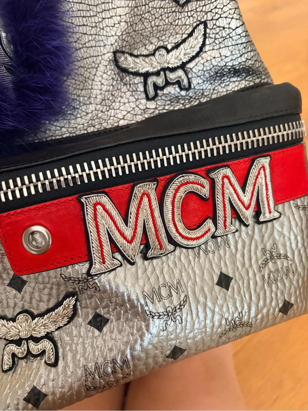 MCM Silver Leather Backpack with Purple Fur Pom